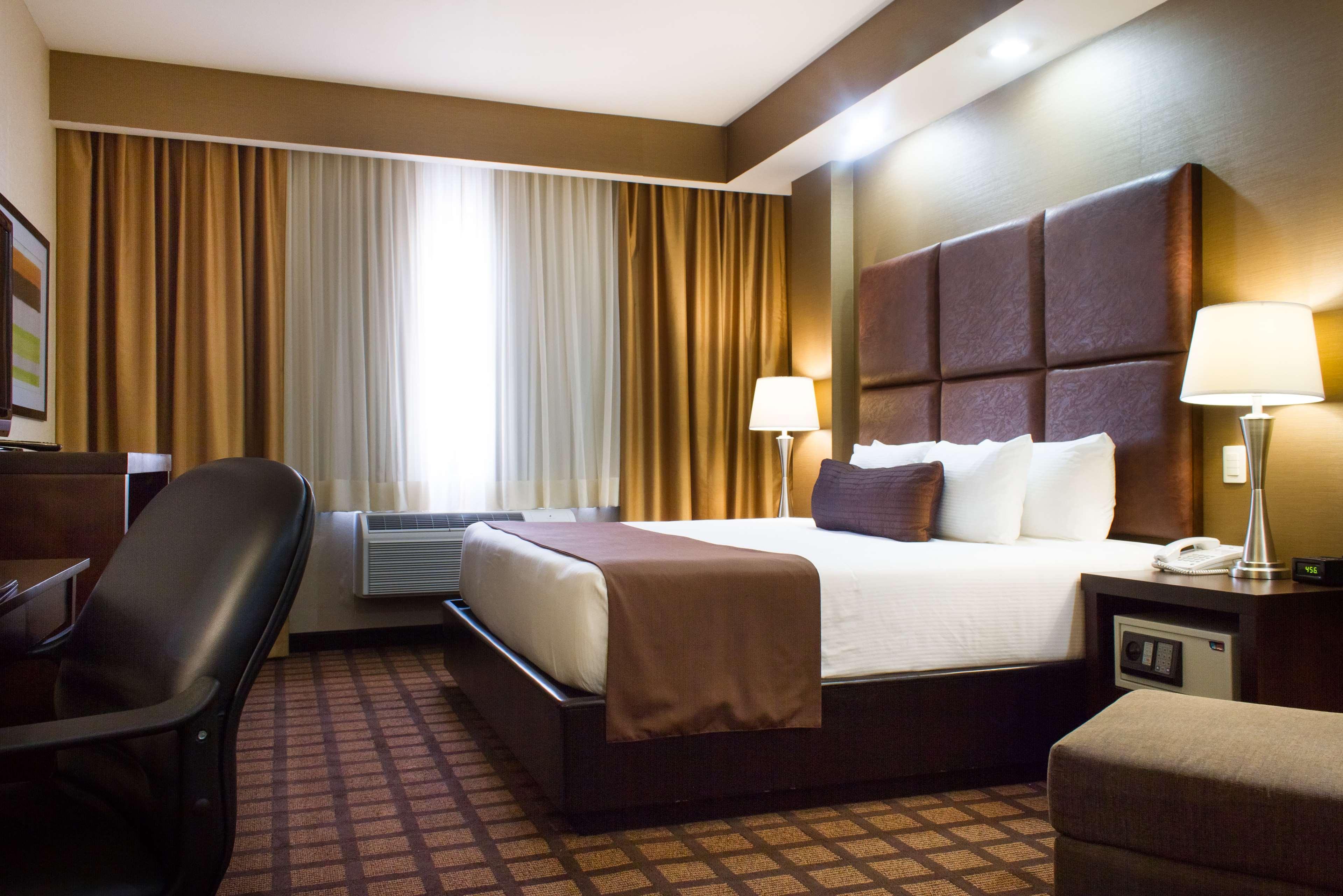 Best Western Premier Monterrey Aeropuerto Apodaca Kültér fotó A typical room at the hotel