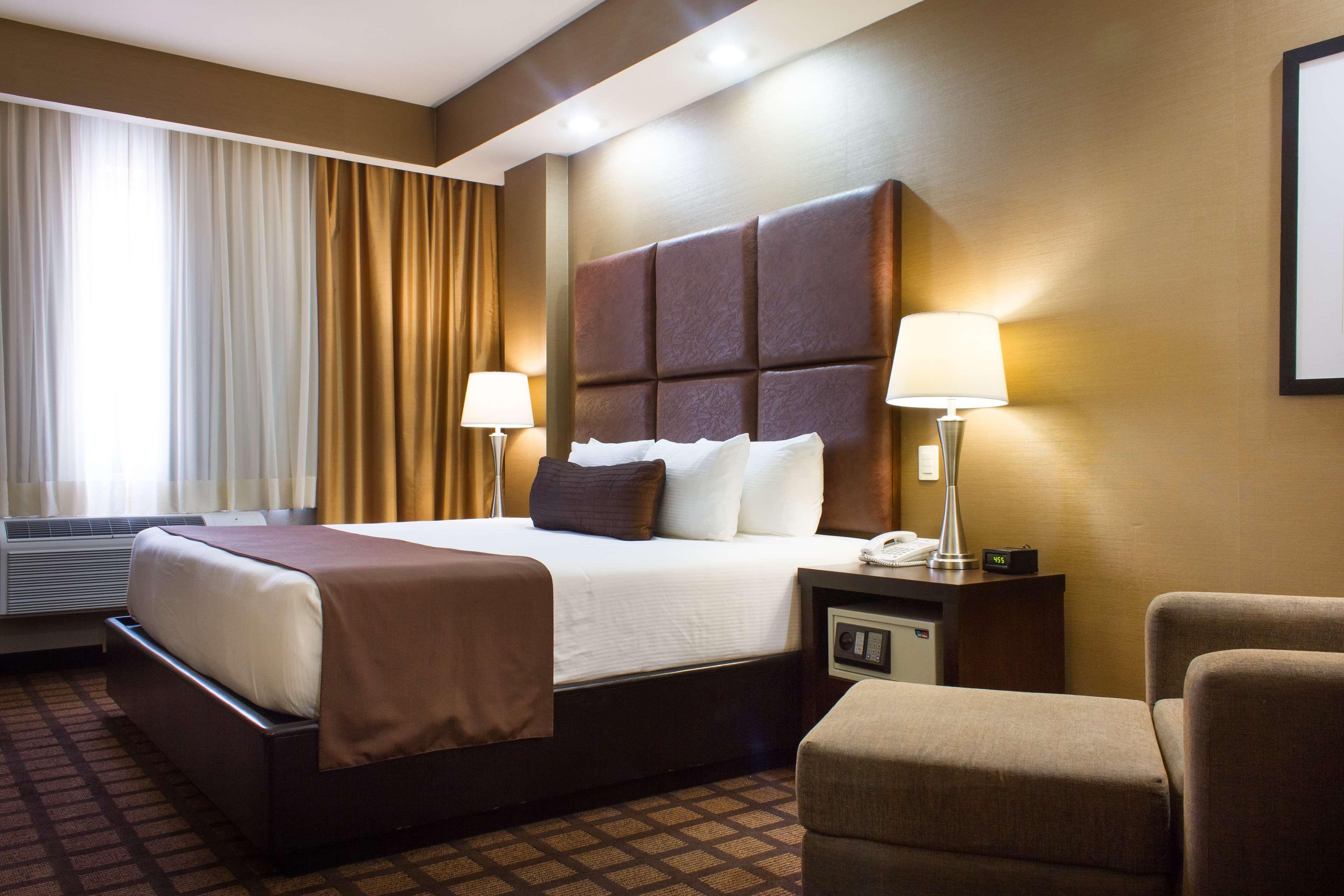 Best Western Premier Monterrey Aeropuerto Apodaca Kültér fotó A typical hotel room