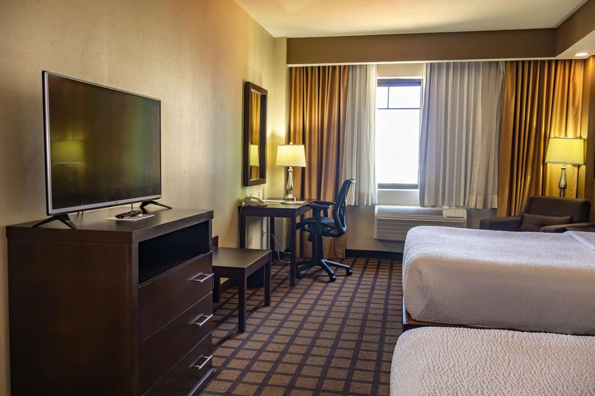 Best Western Premier Monterrey Aeropuerto Apodaca Kültér fotó A typical room at the Hilton Garden Inn