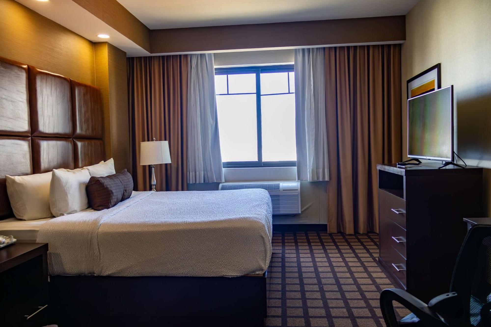 Best Western Premier Monterrey Aeropuerto Apodaca Kültér fotó A typical bedroom in a typical hotel