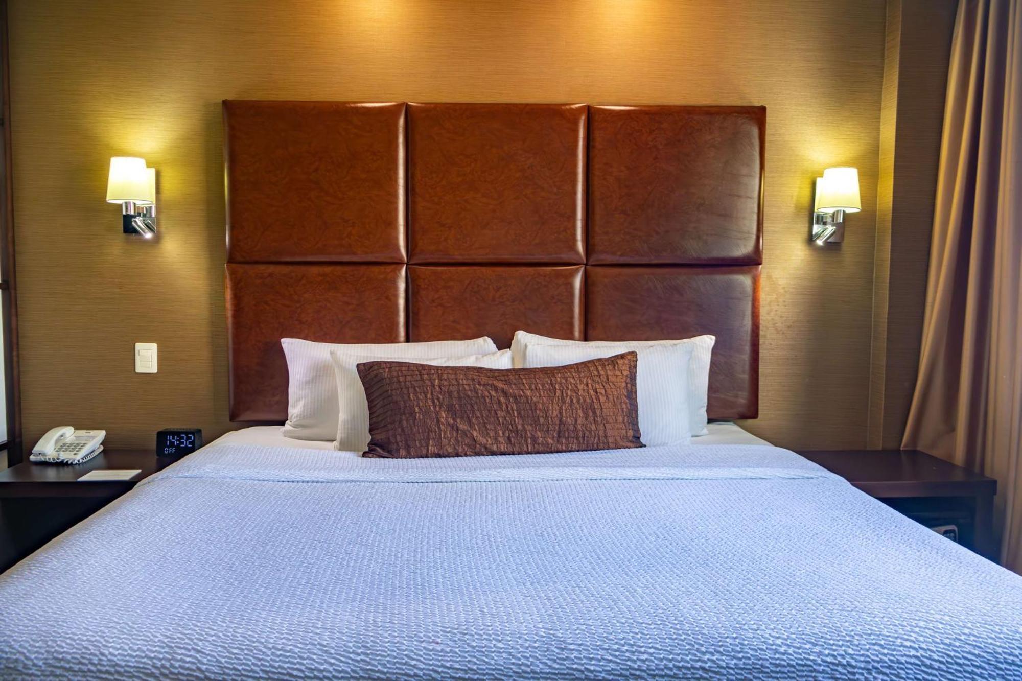 Best Western Premier Monterrey Aeropuerto Apodaca Kültér fotó A bed